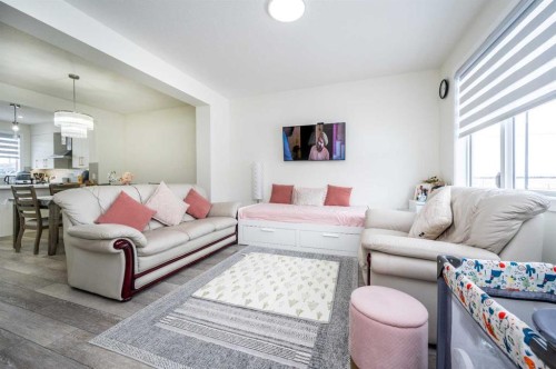 358 Chelsea Common, Chestermere, AB - Indoor Photo Showing Living Room