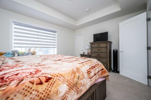 358 Chelsea Common, Chestermere, AB - Indoor Photo Showing Bedroom