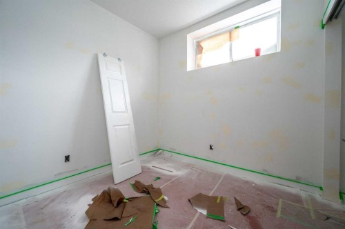 358 Chelsea Common, Chestermere, AB - Indoor Photo Showing Other Room