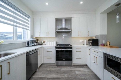 358 Chelsea Common, Chestermere, AB - Indoor Photo Showing Kitchen