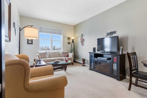 305-37 Prestwick Drive Se, Calgary, AB - Indoor Photo Showing Living Room