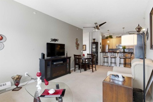 305-37 Prestwick Drive Se, Calgary, AB - Indoor Photo Showing Living Room