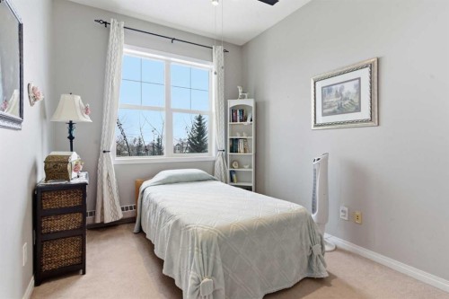 305-37 Prestwick Drive Se, Calgary, AB - Indoor Photo Showing Bedroom