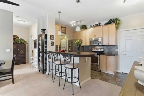 305-37 Prestwick Drive Se, Calgary, AB - Indoor Photo Showing Kitchen With Upgraded Kitchen