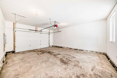 2006 37 Street Se, Calgary, AB - Indoor Photo Showing Garage