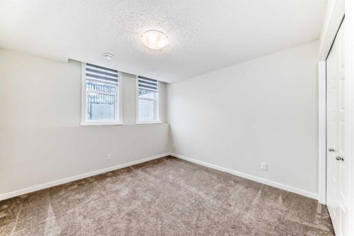 152 Cranbrook Square Se, Calgary, AB - Indoor Photo Showing Other Room