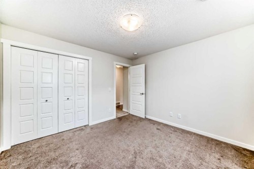 152 Cranbrook Square Se, Calgary, AB - Indoor Photo Showing Other Room