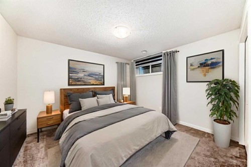 152 Cranbrook Square Se, Calgary, AB - Indoor Photo Showing Bedroom