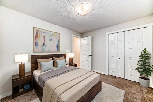 152 Cranbrook Square Se, Calgary, AB - Indoor Photo Showing Bedroom