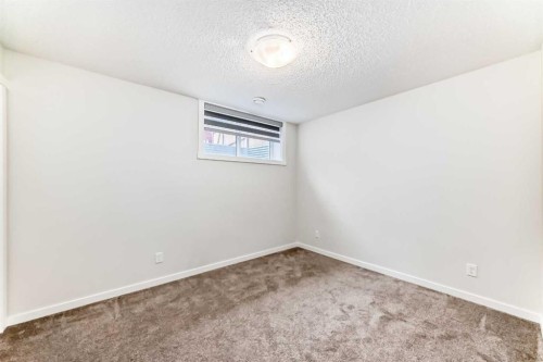 152 Cranbrook Square Se, Calgary, AB - Indoor Photo Showing Other Room