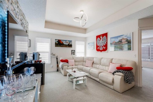 87 Evanswood Circle Nw, Calgary, AB - Indoor Photo Showing Living Room