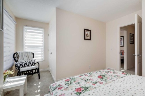 87 Evanswood Circle Nw, Calgary, AB - Indoor Photo Showing Bedroom