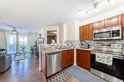 1219-8 Bridlecrest Drive Sw, Calgary, AB - Indoor Photo Showing Kitchen With Stainless Steel Kitchen