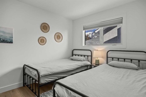 157 Cougar Point Road, Canmore, AB - Indoor Photo Showing Bedroom