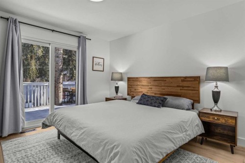 157 Cougar Point Road, Canmore, AB - Indoor Photo Showing Bedroom