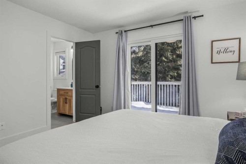 157 Cougar Point Road, Canmore, AB - Indoor Photo Showing Bedroom