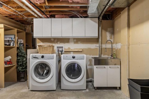 157 Cougar Point Road, Canmore, AB - Indoor Photo Showing Laundry Room