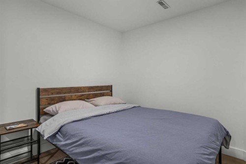 157 Cougar Point Road, Canmore, AB - Indoor Photo Showing Bedroom