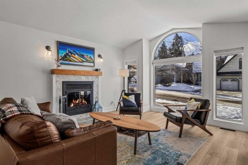 157 Cougar Point Road, Canmore, AB - Indoor Photo Showing Living Room With Fireplace