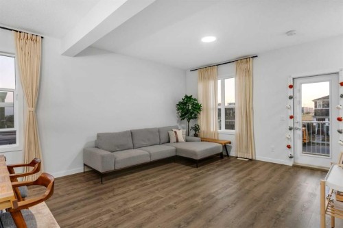 28 Redstone Boulevard Ne, Calgary, AB - Indoor Photo Showing Living Room