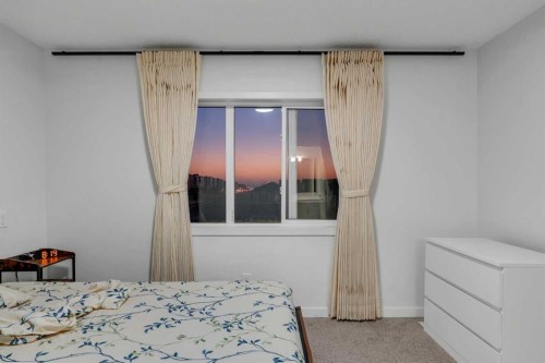 28 Redstone Boulevard Ne, Calgary, AB - Indoor Photo Showing Bedroom