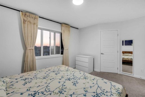 28 Redstone Boulevard Ne, Calgary, AB - Indoor Photo Showing Bedroom