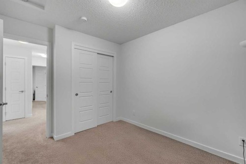 28 Redstone Boulevard Ne, Calgary, AB - Indoor Photo Showing Other Room