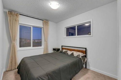 28 Redstone Boulevard Ne, Calgary, AB - Indoor Photo Showing Bedroom