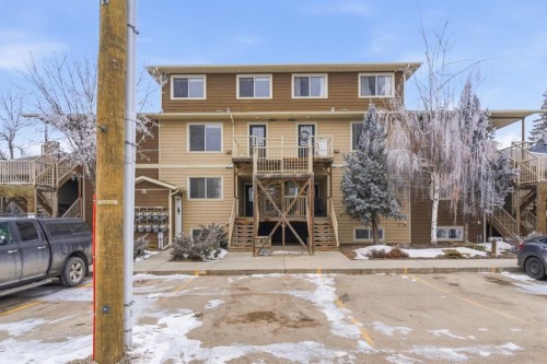 207-323 Fourth Avenue, Strathmore, AB - Outdoor With Facade