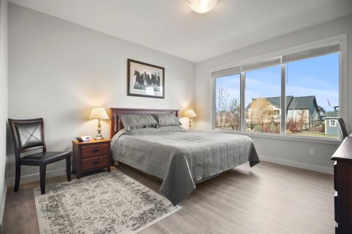 4 Cimarron Estates Gardens, Okotoks, AB - Indoor Photo Showing Bedroom