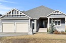 4 Cimarron Estates Gardens, Okotoks, AB  - Outdoor With Facade 