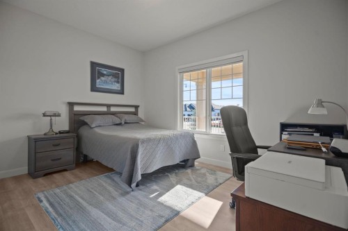 4 Cimarron Estates Gardens, Okotoks, AB - Indoor Photo Showing Bedroom
