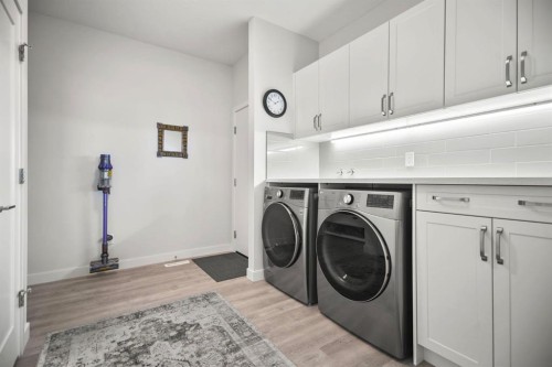 4 Cimarron Estates Gardens, Okotoks, AB - Indoor Photo Showing Laundry Room