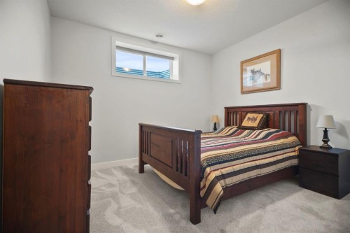 4 Cimarron Estates Gardens, Okotoks, AB - Indoor Photo Showing Bedroom