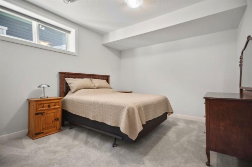 4 Cimarron Estates Gardens, Okotoks, AB - Indoor Photo Showing Bedroom