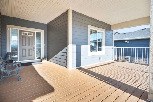 4 Cimarron Estates Gardens, Okotoks, AB - Outdoor With Deck Patio Veranda With Exterior