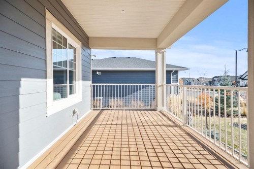 4 Cimarron Estates Gardens, Okotoks, AB - Outdoor With Deck Patio Veranda With Exterior