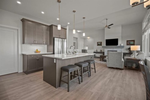 4 Cimarron Estates Gardens, Okotoks, AB - Indoor Photo Showing Kitchen With Stainless Steel Kitchen With Upgraded Kitchen