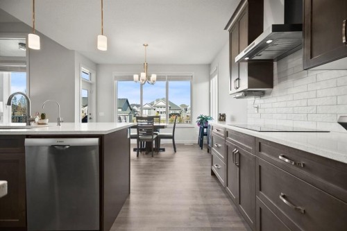 4 Cimarron Estates Gardens, Okotoks, AB - Indoor Photo Showing Kitchen With Upgraded Kitchen