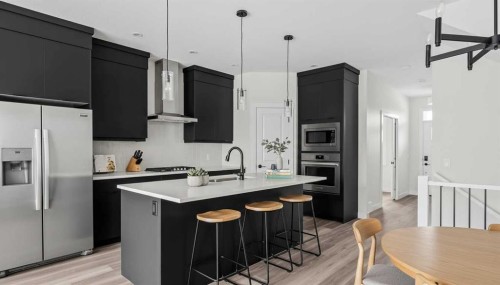 82 Herron Common Ne, Calgary, AB - Indoor Photo Showing Kitchen With Upgraded Kitchen