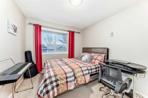 82 Citadel Point Nw, Calgary, AB - Indoor Photo Showing Bedroom