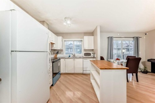 82 Citadel Point Nw, Calgary, AB - Indoor Photo Showing Kitchen With Double Sink