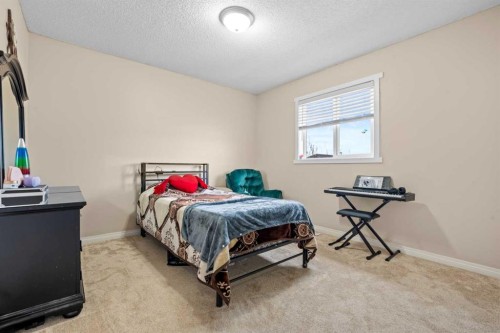 332 Oakmere Way, Chestermere, AB - Indoor Photo Showing Bedroom