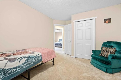 332 Oakmere Way, Chestermere, AB - Indoor Photo Showing Bedroom