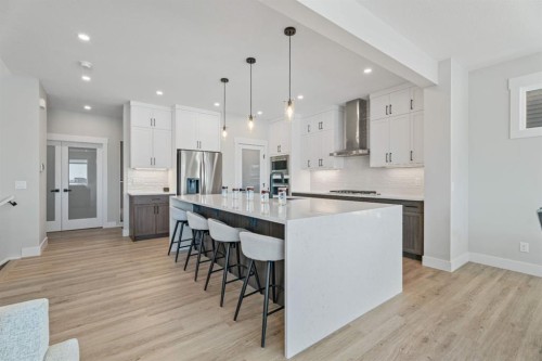 235 Chelsea Park, Chestermere, AB - Indoor Photo Showing Kitchen With Upgraded Kitchen