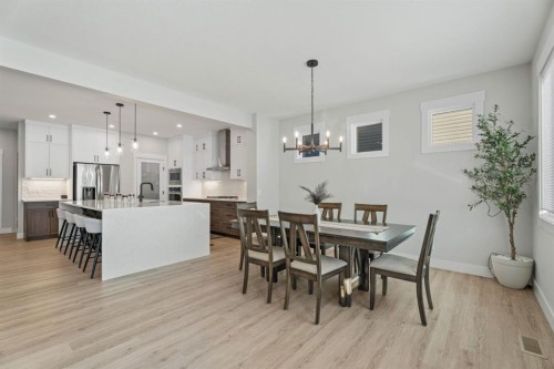 235 Chelsea Park, Chestermere, AB - Indoor Photo Showing Dining Room