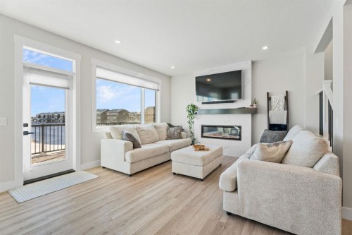 235 Chelsea Park, Chestermere, AB - Indoor Photo Showing Living Room With Fireplace
