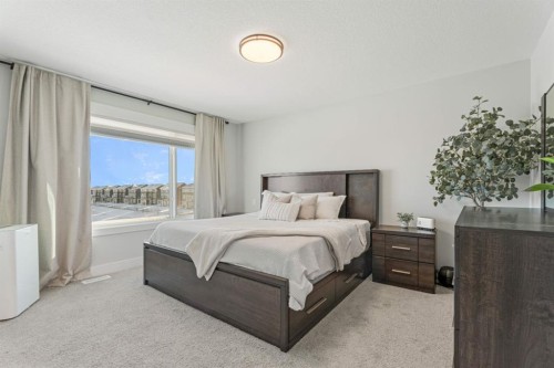 235 Chelsea Park, Chestermere, AB - Indoor Photo Showing Bedroom