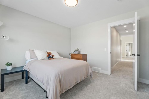 235 Chelsea Park, Chestermere, AB - Indoor Photo Showing Bedroom