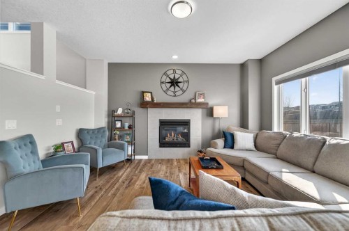 242 Mahogany Passage Se, Calgary, AB - Indoor Photo Showing Living Room With Fireplace